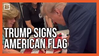 Trump Signs American Flag on Anniversary of 9/11