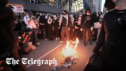 Pro-Palestinian protesters burn US-Israel flag in Chicago