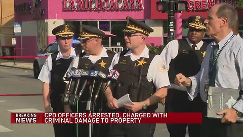 Two CPD officers arrested, charged with criminal damage to property