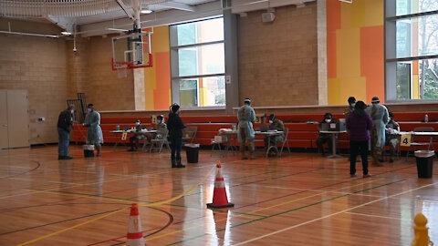 Maryland National Guard Members assist with COVID-19 testing in Wheaton Maryland.