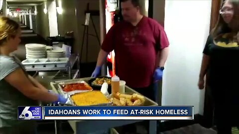 Small nonprofit team works overtime cooking hundreds of meals per day for at-risk homeless