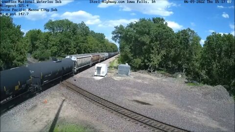 EB CN L570 Manifest with Empty Coal cars on the end of train at Mills Tower on June 9, 2022