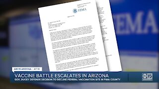 Vaccine battle escalates in Arizona