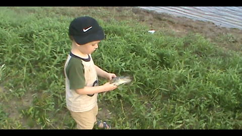 Tot Boy Freaks Out Over A Fish