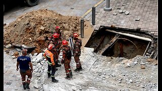 SINKHOLE OPENS UP, SWALLOWS WOMAN IN KUALA LUMPUR MALAYSIA