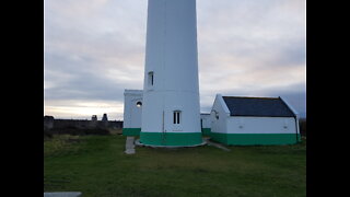 Night lapse next a lighthouse. GoPro