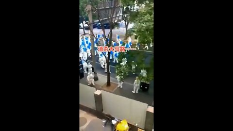 Workers spray the streets to fight COVID-19 in China