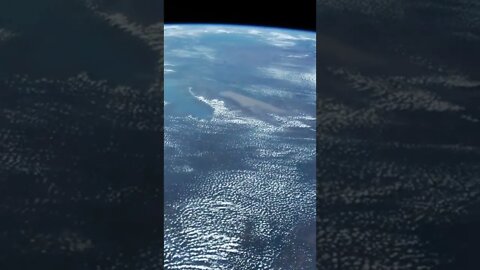 Earth from The Orbit With Clouds