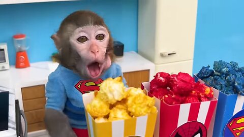 Baby Monkey with Colorful Popcorn