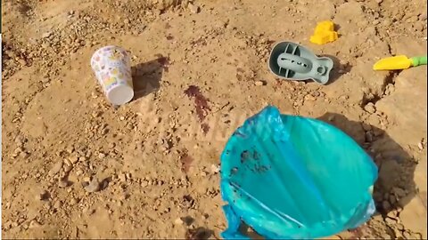 The beach in Sevastopol after Zelensky's terror attack, destroyed children toys and blood are seen