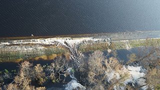 Floodwaters Breach Power Plant's Dam, Raise Coal Ash Concerns