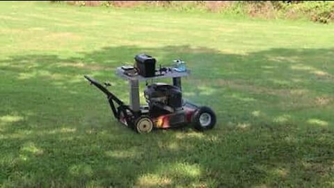 Guy invents remote controlled lawnmower