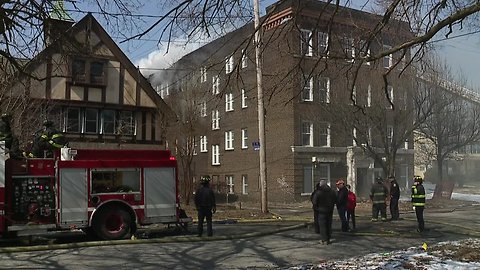 Cleveland firefighters evacuated from burning building for fear of roof collapse