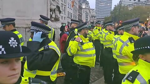 police wait for arrested protesters to be taken in #metpolice