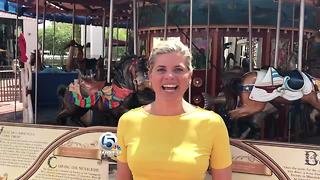 WPTV personalities ride a Merry-Go-Round