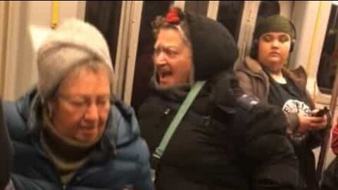 Unhinged elderly woman yells for seat in subway