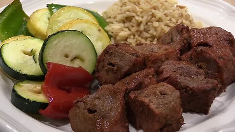 Beef Kabobs Hanging in the Pit Barrel Cooker