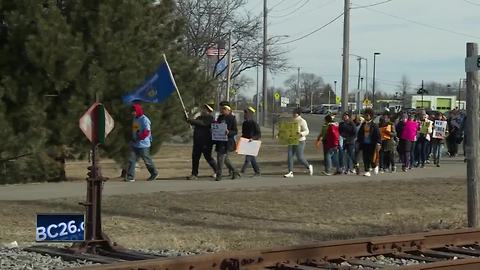 Students press for tougher gun laws with walk to Janesville