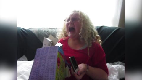 Excited Girl Gets a Cell Phone For Her Birthday