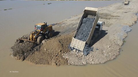 New road building cross lake mighty machines operating skill Bulldozer.