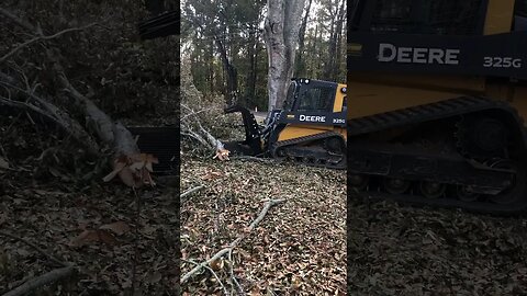 First time using the grapple on a job. #skidsteer #johndeere