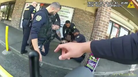 Orlando police body camera footage shows man’s arrest at shopping center before he died