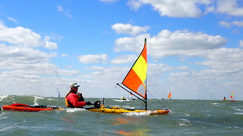 kayak sail at maximum hull speed while reaching.