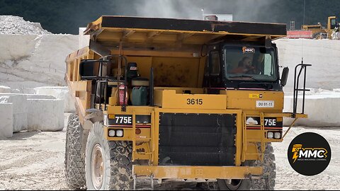 Caterpillar 992C Unloads HUGE Marble Blocks from a 775E Dumber