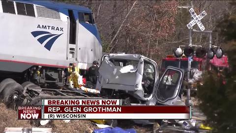 Train carrying lawmakers collides with garbage truck