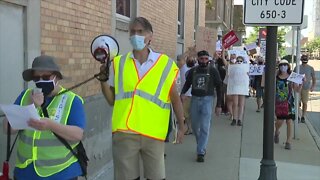 Hundreds of Royal Oak protesters gather for 'Save the Post Office' rally