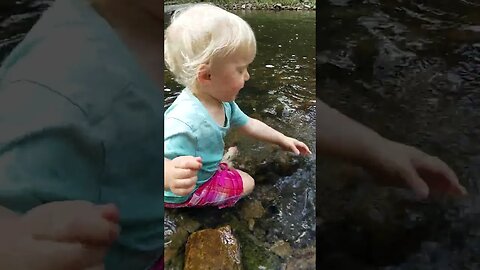 My Heart :) One Year Old Organizing Rocks In The Creek