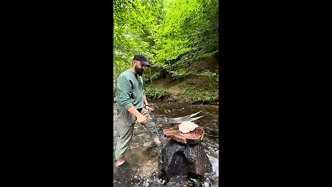 Camping Dutch oven chicken cooking