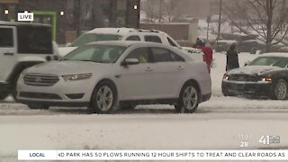 Strangers helping stuck cars