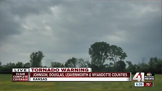 Tornado north of De Soto wrapped in rain