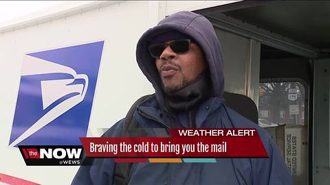 Mail carrier braves freezing temps to deliver mail