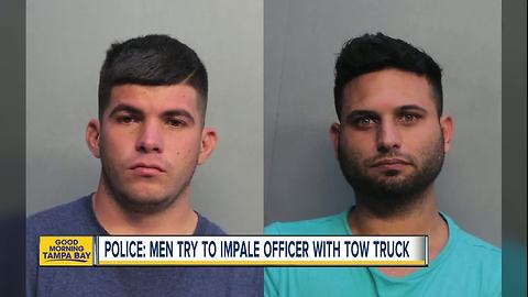 Police: Men attempt to impale Miami-Dade officer with tow truck's boom