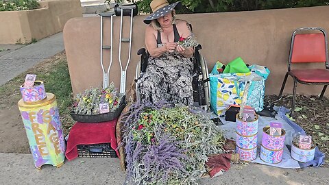 Kay Kay is spinning sage sticks in taos new mexico