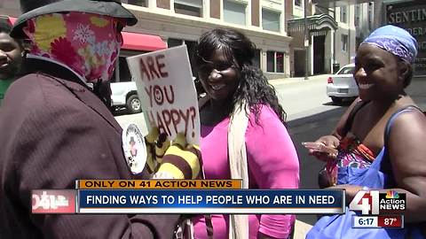 Masked man helps people in need in KC