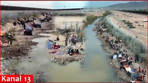 Drone footage shows barbed wire separating migrants and US National Guard in Texas