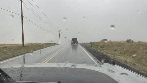 Raining outside while in the vehicle passenger seat