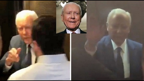 Orrin Hatch waves off unhinged leftist protesters at elevator