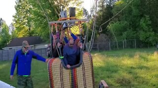 Time lapse footage of hot air balloon countryside adventure