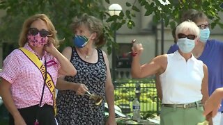 Organizers ring bells to celebrate 19th amendment