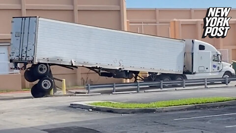 Semi-truck's back wheels ripped off in epic fail