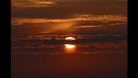 SUN BEING AHEAD AND BEHIND CLOUDS