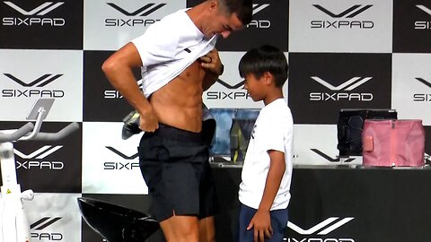 Cristiano Ronaldo shows his abs to little Japanese kid