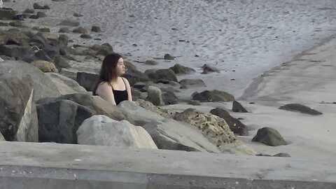 Girl enjoying beach with volleyball