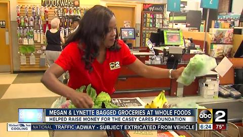 Megan Knight, Lynette Charles bagged groceries at Whole Foods for Casey Cares Foundation