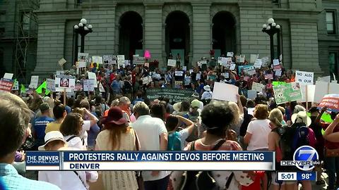 Educators and others protest Betsy DeVos' upcoming speech at Denver conservative conference