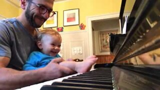 Baby plays piano with his feet!